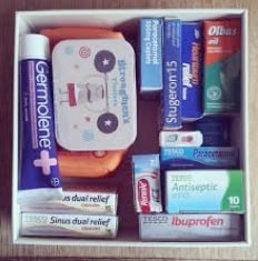 A simple home medicines kit with over–the-counter remedies for everyday ailments